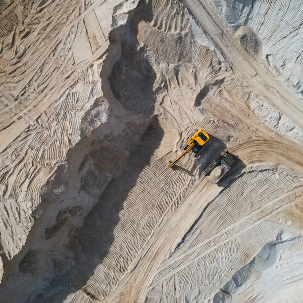 istock Aerial view of sand quarry with bulldozer 1032146044