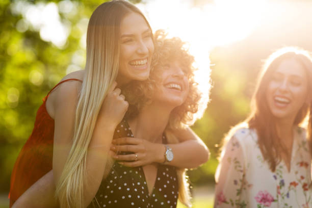 istock Young women hanging out at sunset 1032154262