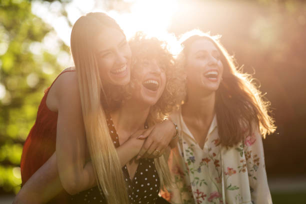 istock Young women hanging out at sunset 1032154560