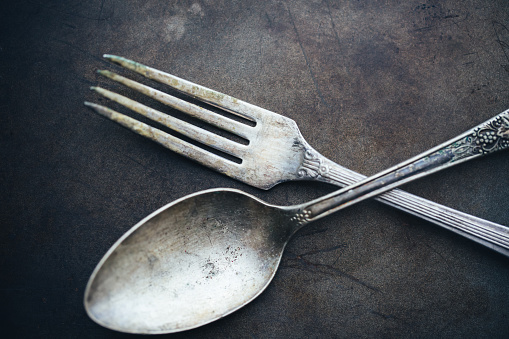 Cutlery on white wooden table