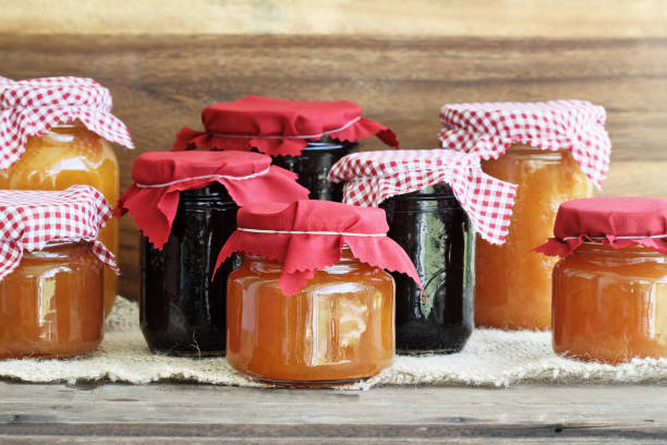 jars of a variety of homemade jam - chutney imagens e fotografias de stock