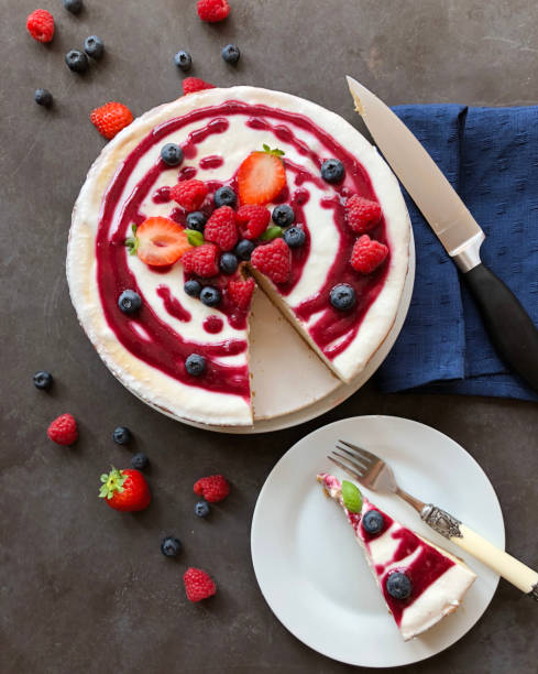 istock Cheesecake with berries on top and coulis 1032162658