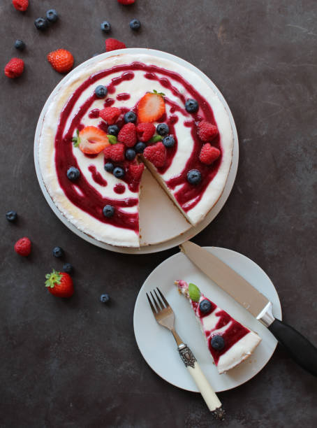 istock Cheesecake with berries on top and coulis 1032162660