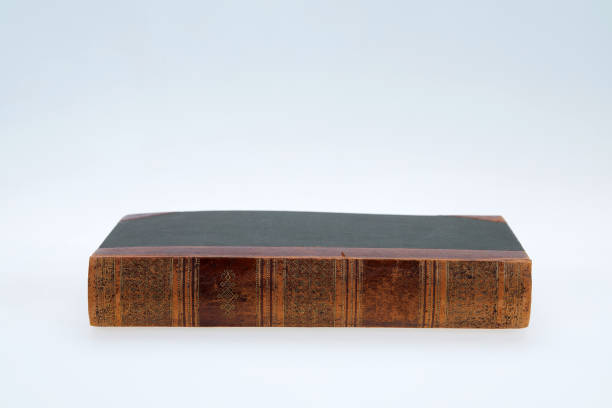 Vintage book lying on white background