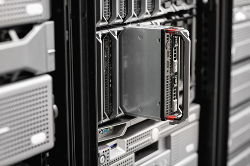 Closeup of blade server rack and SAN at enterprise datacenter