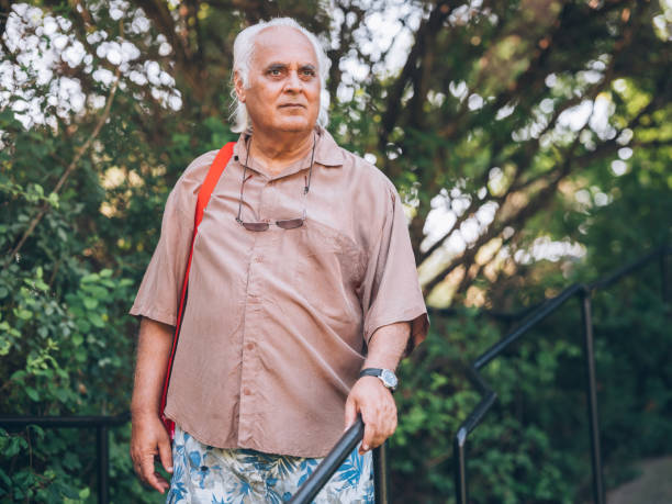 istock Senior walking in public park 1032169358