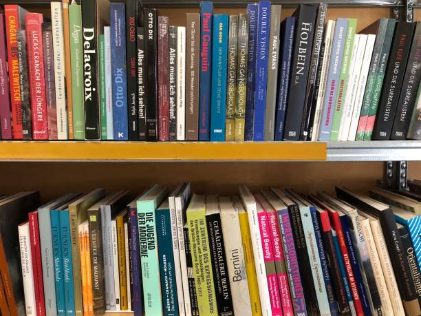 istock Book shelves filled with new books 1032170024