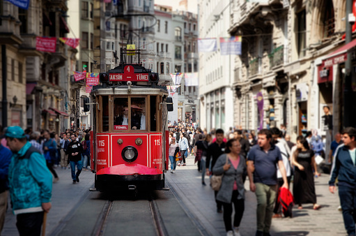 ISTANBUL, TURKEY - MAY 02, 2018: the old tram and people walking in Taksim on May 02, 2018 on Istanbul, Turkey