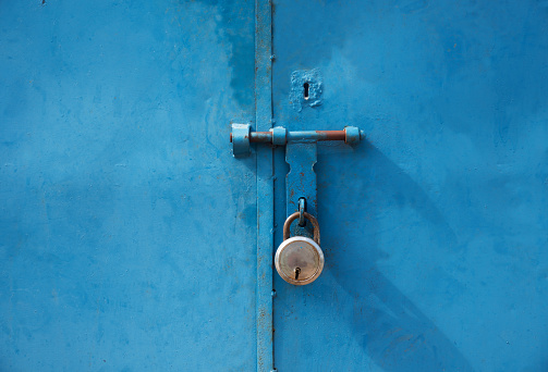 Old Blue Closed Door With Padlock