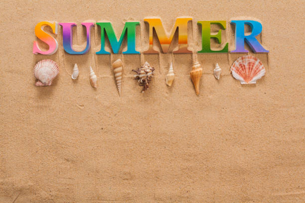 istock summer written in colorful letters on the beach with copy space 1032183788