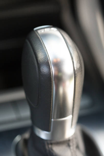 istock automatic gear stick of a modern car, car interior details 1032184366