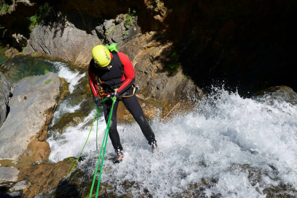 canyoneering in pyrenees - number of people human gender people waterfall imagens e fotografias de stock