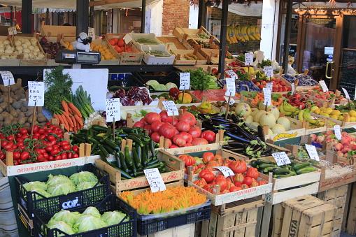 Farmer's market stall in spring - fresh herbs and spring onions