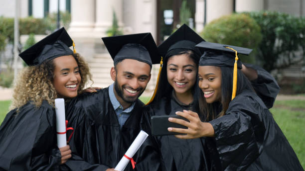 Group of graduates take selfie