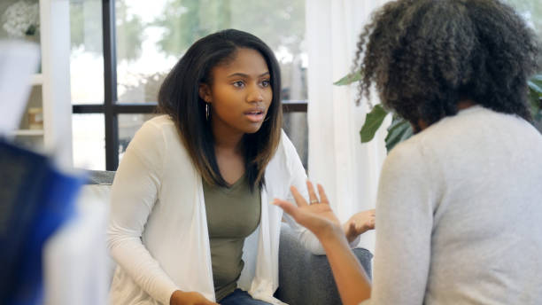 istock Unrecognizable mom pleads with teenage daughter 1032210062