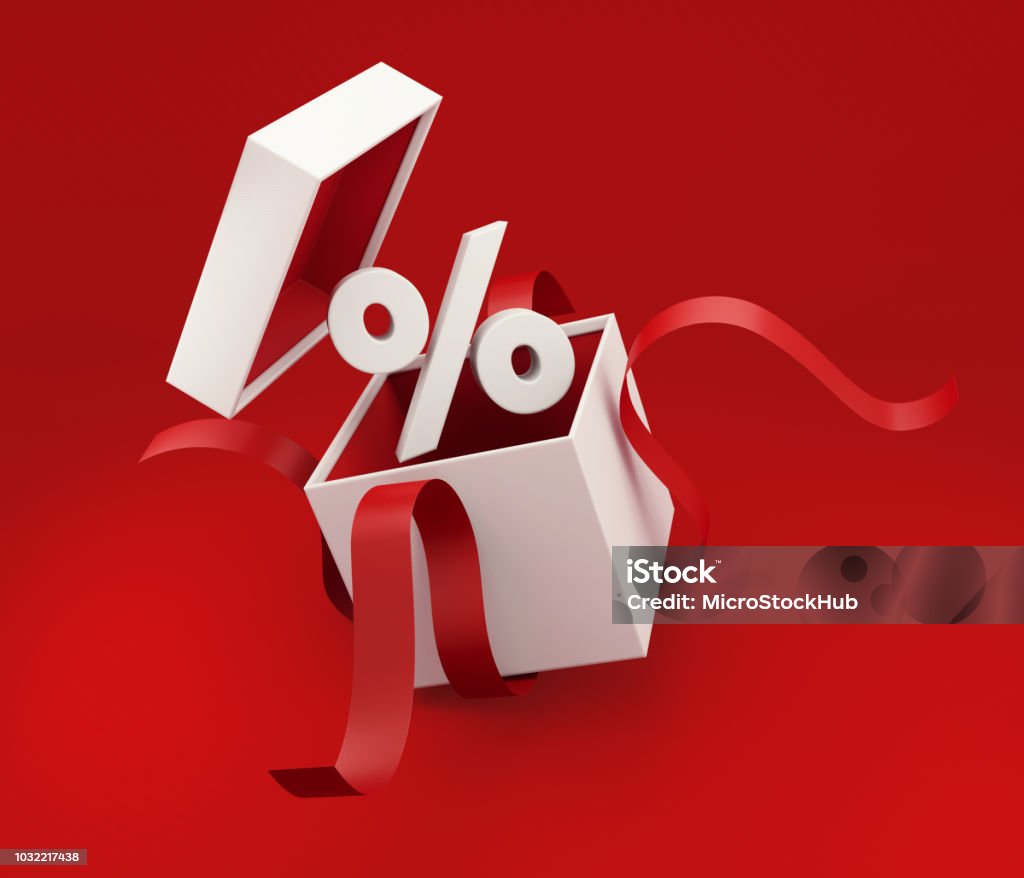 White Gift Box Tied with Red Ribbon Is Being Unwrapped Whit gift box tied with red ribbon is being unwrapped on red background. Percentage sign is coming out of the box. Horizontal composition with copy space, Great use for Christmas and Valentine's Day related gift concepts. Sale Stock Photo