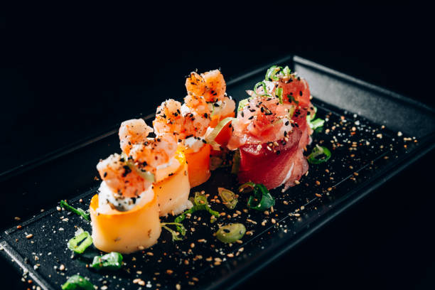 istock Salmon and tuna rolls 1032221258
