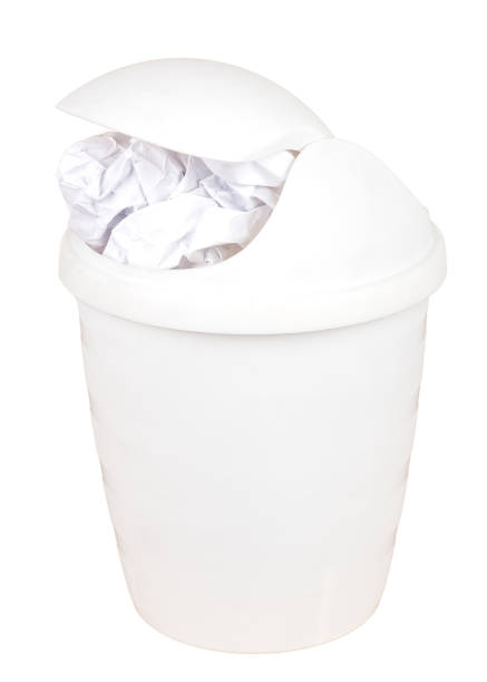 istock White plastic recycle bin filled with paper isolated on white background 1032221446