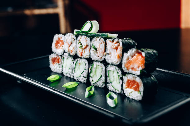 istock Salmon and cucumber maki sushi 1032222690
