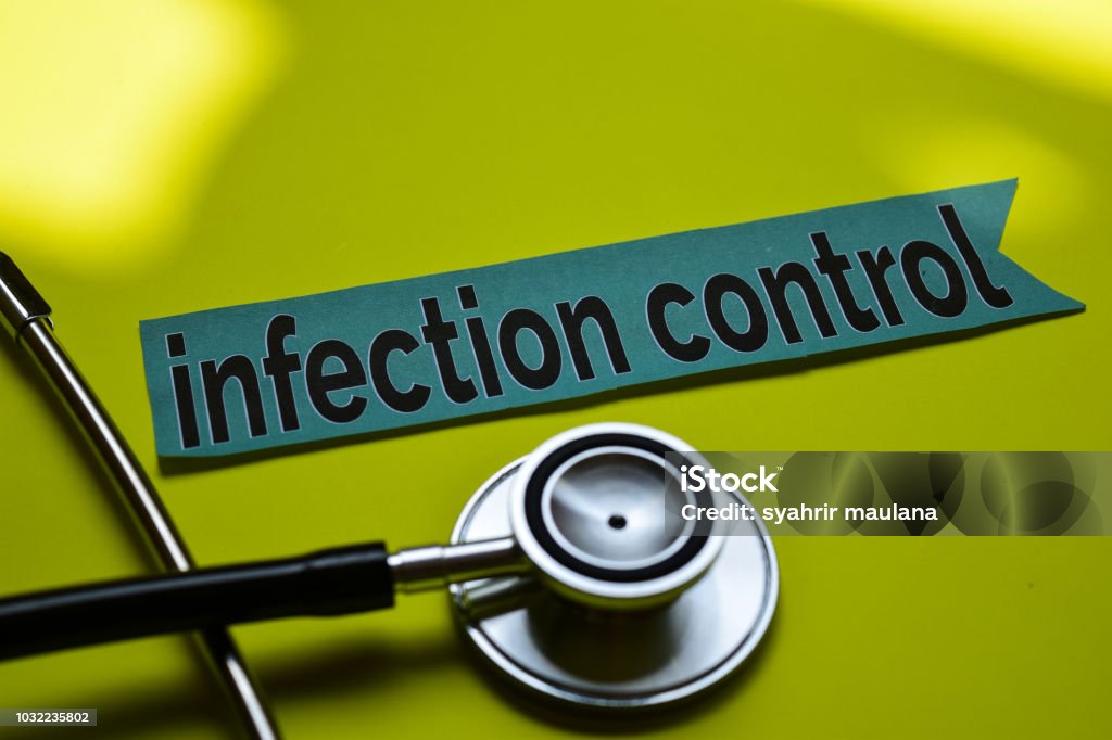 infection control Closeup infection control with stethoscope concept inspiration on yellow background Infectious Disease Stock Photo