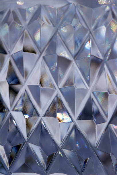 istock Defocused macro abstract of diamond pattern cut lead crystal glass 1032240006