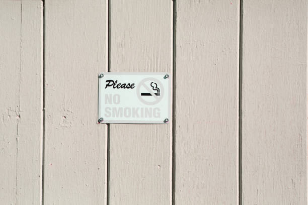 istock No smoking sign on wood wall 1032243298