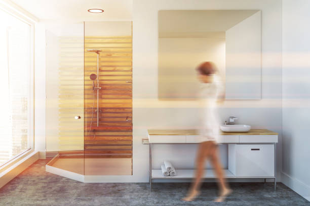 istock Luxury white bathroom sink and shower, woman 1032253886