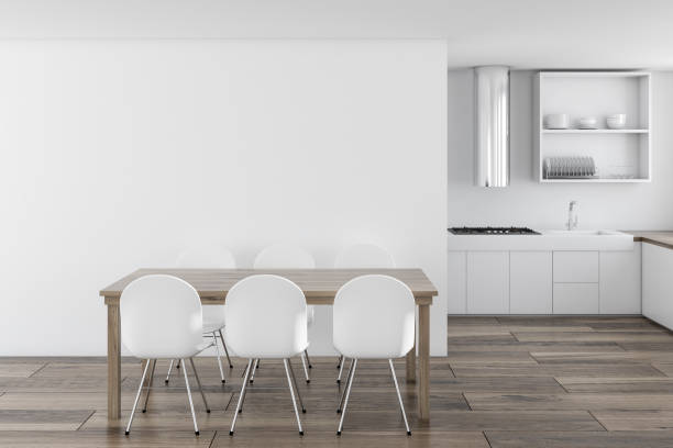 istock White dining room, wooden table 1032255578