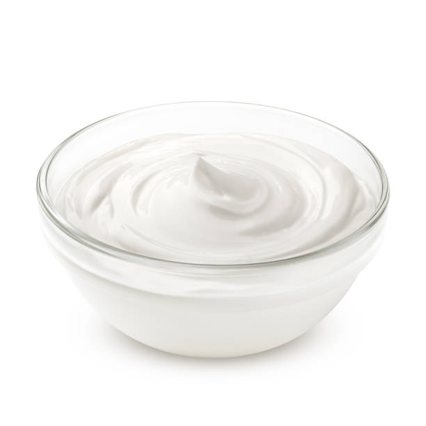 sour cream in glass, mayonnaise, yogurt, isolated on white background, clipping path, full depth of field sour cream in glass, mayonnaise, yogurt, isolated on white background, clipping path, full depth of field curd cheese stock pictures, royalty-free photos & images