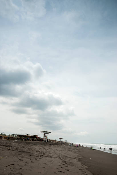 istock Pacific ocean beach in Champerico, Retalhuleu, Guatemala, Dramatic clouds and intense surge. 1032286156