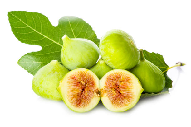 istock Fresh figs with its leaves isolated on a white background 1032296556