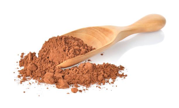 istock Cocoa powderl in wooden spoon on white background 1032320022