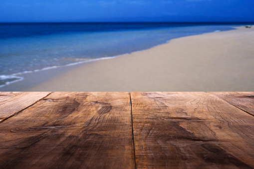 Pine wood table in caribbean beach