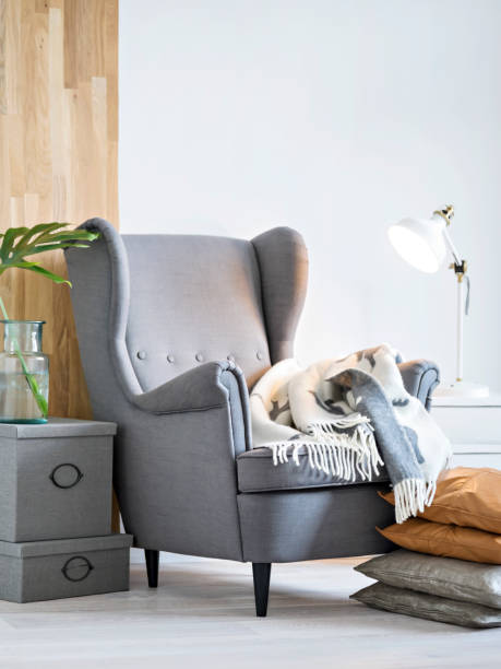 istock Cozy gray colored armchair in home interior. 1032335238
