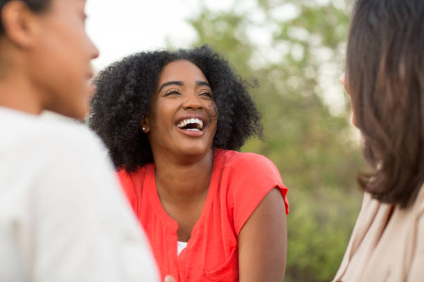 istock Multi-ethnic group of women laughing and talking. 1032335246