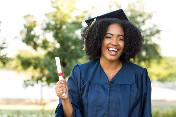 istock Young African American woman graduating. 1032335254