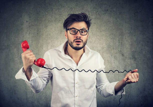 istock Man receiving shocking news on a phone feeling anxious 1032339250