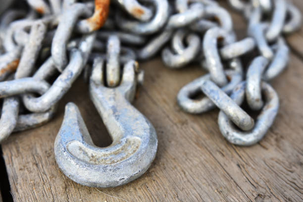 istock Steel Industrial tow Chain Close Up 1032343778