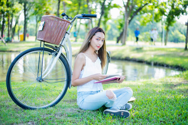 istock Student reading a book in the park. Ready to go to University. 1032356402