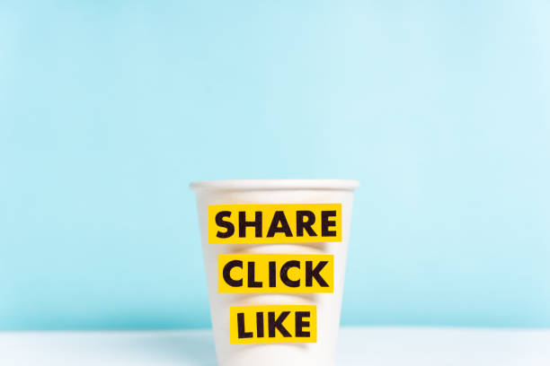 Share click like words. Blank craft paper coffee cup on blue background.