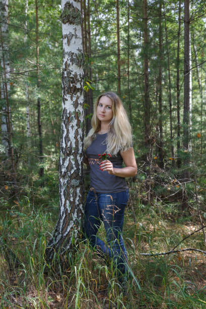 istock Girl in the forest 1032420492