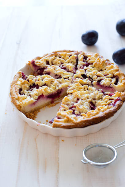 istock Homemade plum cake and fresh plums 1032425658