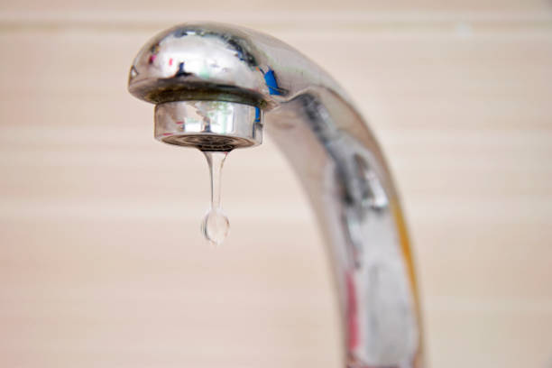 istock Drops of water falling down from the crane 1032437066