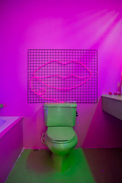abandoned bathroom on Neon lights concept at studio. stock photo