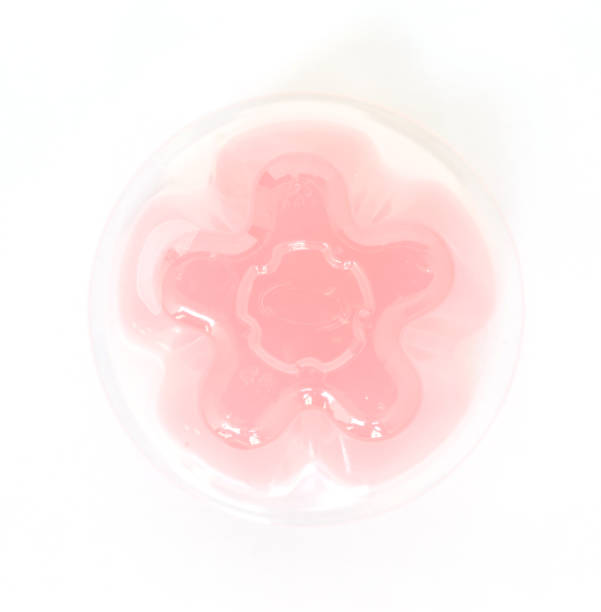 istock pink gelatin dessert on white background 1032457622