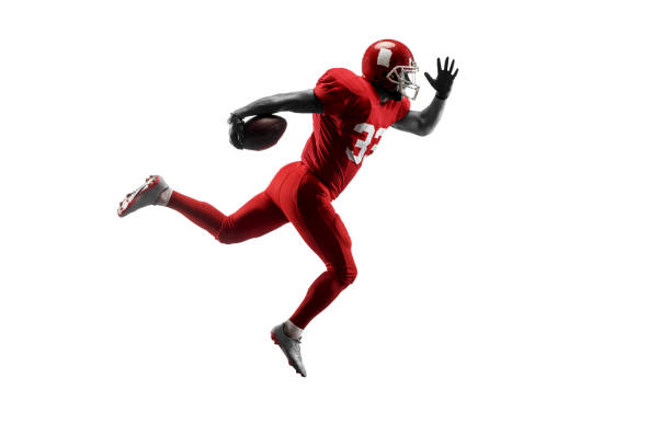 istock one american football player man studio isolated on white background 1032457850