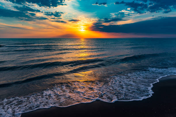 istock Amazing colorful sunrise at sea 1032460282