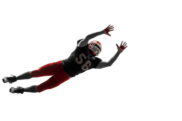 istock one american football player man studio isolated on white background 1032460936