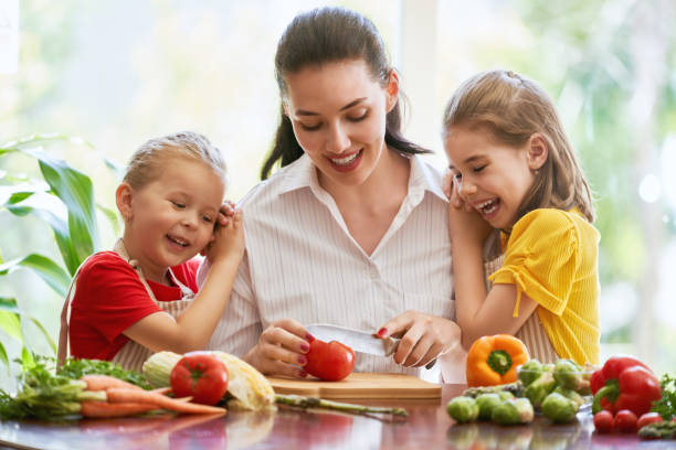 istock Happy family in the kitchen. 1032464552