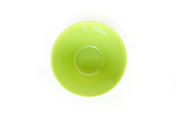 green bowl top view on white background